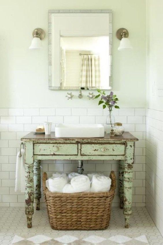 Unique Bathroom Vanity Ideas : 25 Creative Sinks Made To Impress - This show stopping piece, designed by jennifer mehditash, features a double vanity, marble countertop (trend alert!), brass fixtures and a gorgeous hue of navy blue.