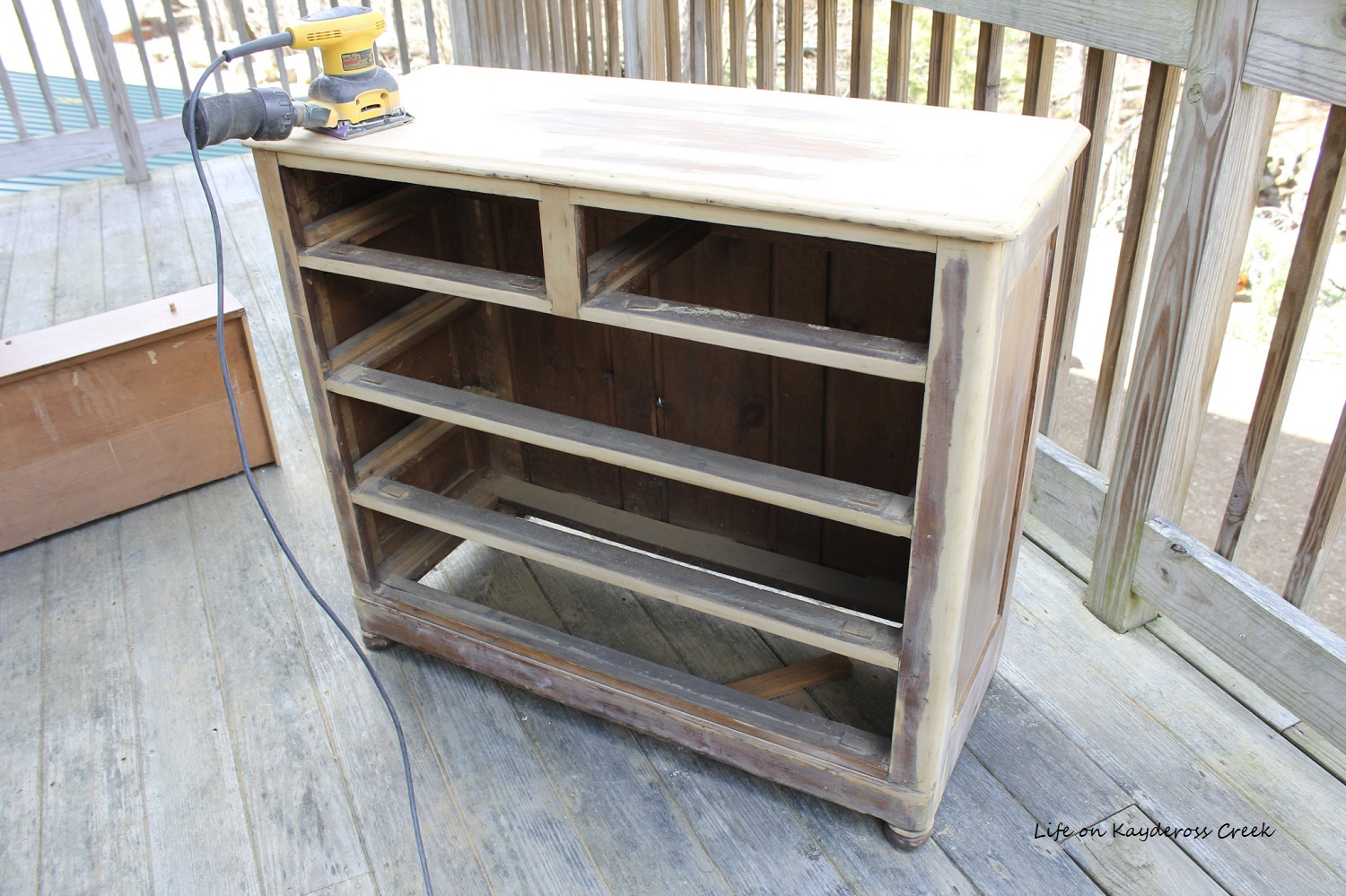 Dresser makeover sanding off the stain Life on Kaydeross Creek